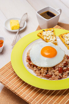 Colombian Calentado Breakfast with Fried Egg, Arepa, Hogao and Tinto Coffee