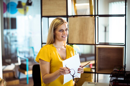 Young businesswoman presenting ideas in modern office