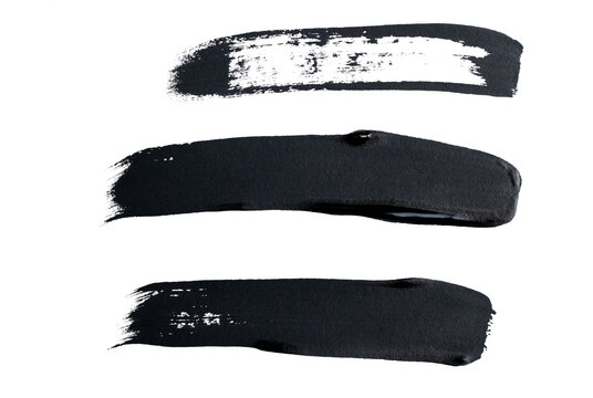 Conjunto de pinceladas negras abstractas con textura art&iacute;stica sobre fondo transparente
