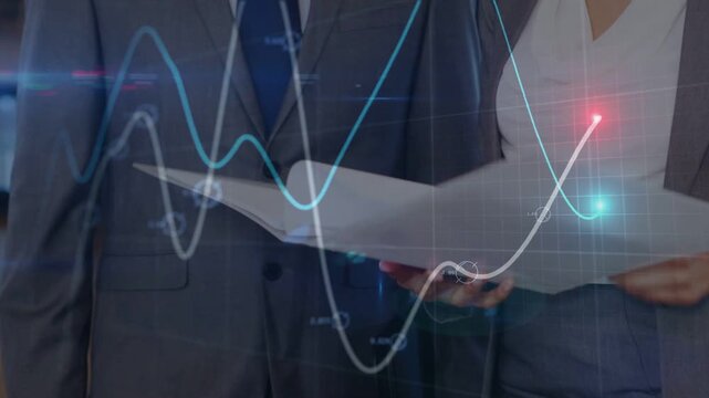 Woman shifting folder scanning docs while man pointing chart highlighting business data review