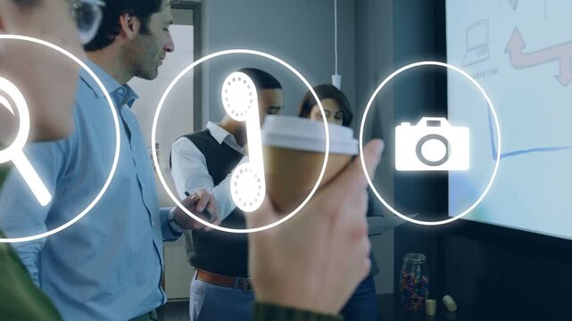 Hand holding cup moving across meeting, sparking icons glowing then fading over charts guiding team
