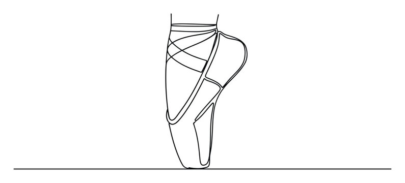 Graceful ballet dancers foot in pointe shoe with ribbons, perfect for dance school advertisements