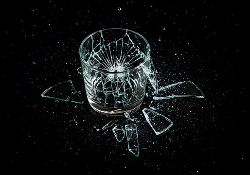 Shattered glass object on black background