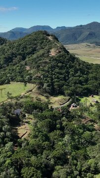 The city of Bom Retiro is located in the mountains of Santa Catarina. It's near Urubici and Florianopolis. Aerial view in vertical video