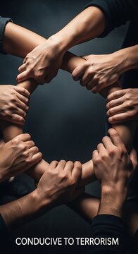 Diverse hands forming a united circle against dark background.