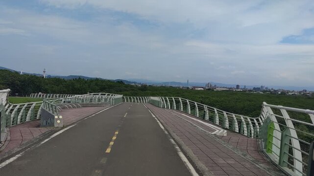 View of bike path, New Taipei City, Taiwan &ndash; May 12, 2026: Views of Danjiang Bridge, New Taipei City, Taiwan