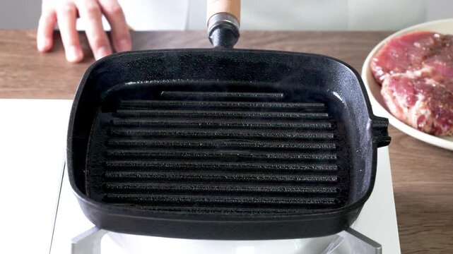 Grilled meat in a cast iron pan.
