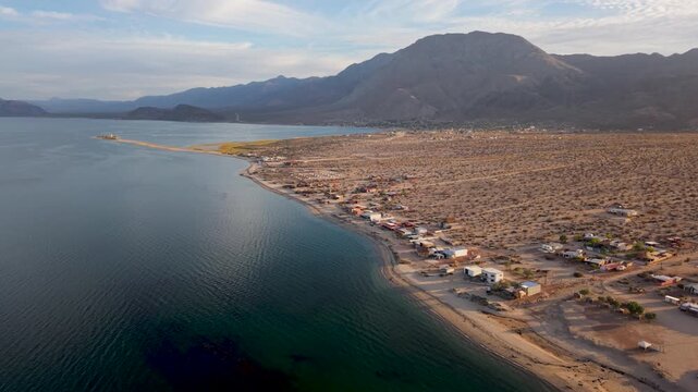 Aerial shots show Bahia de Los Angeles in Baja California during late afternoon with water and land visible along the shore.