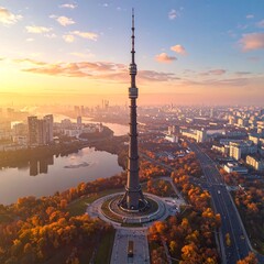 Obraz premium Aerial view of a tall tower with a cityscape and lake