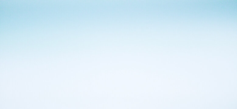 Bright soft light blue abstract gradient background with a clean, smooth, and minimalist empty surface.