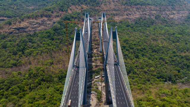 Drone Shot of Modern Expressway Bridge in Maharashtra
Aerial View of Sahyadri Expressway Bridge and Tunnel
Drone View of India&rsquo;s Highest Cable Stayed Bridge