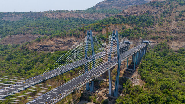 Drone Shot of Modern Expressway Bridge in Maharashtra
Aerial View of Sahyadri Expressway Bridge and Tunnel
Drone View of India&rsquo;s Highest Cable Stayed Bridge