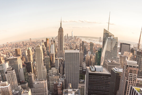 Fisheye aerial view of Manhattan in New York City, USA. Skyline panorama at sunset. Fish eye lens effect