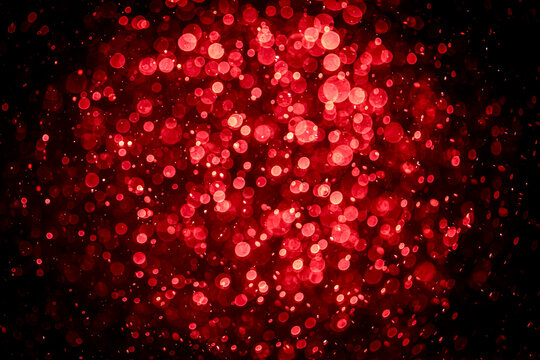 Blurred photo with red dots visible glittering, shining brightly look and feel luxurious