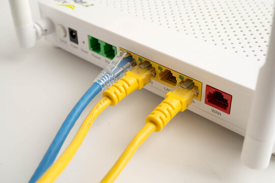 Ethernet cable with wireless router connect to internet service provider network.
