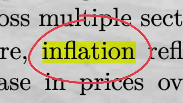 Inflation Highlighted in Newspaper Article Economic Crisis and Rising Prices Concept