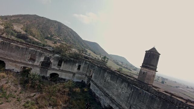 Drone flying over abandoned ex hacienda caxcantla ruins in mexico