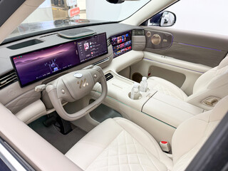 Fototapeta premium Shanghai, China - November 27, 2025: IM LS9 Electric SUV Interior with Panoramic Screens and White Leather