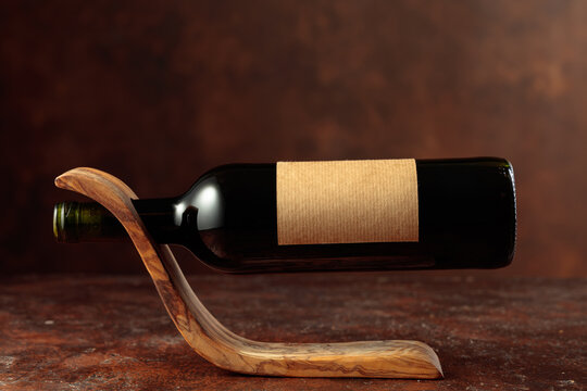 Bottle of red wine with empty label.