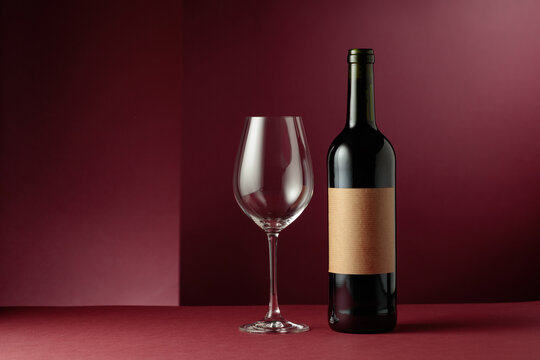 Red wine on a dark red background.