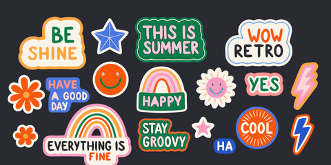 Fototapeta premium Colorful retro sticker collection with inspirational phrases and playful illustrations on a dark background