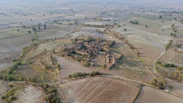 Drone flying towards abandoned ex hacienda caxcantla ruins in mexico