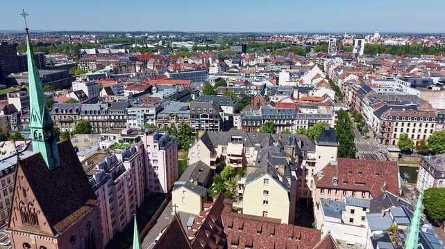 Drone flying above Saint Pierre le Jeune church in central Strasbourg