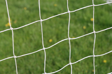 Close up of a football goal net on a pitch © Francesca Leslie