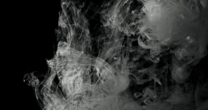 White water vapor drifting and flowing effect against a black background