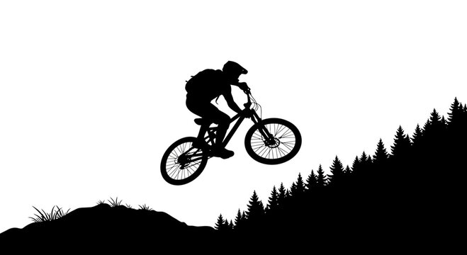 Mountain biker jumping in the forest silhouette