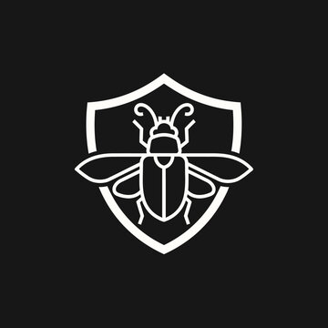 Simple white outline of a beetle on a shield badge with black background