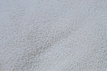 Soft and comfortable white fleece fabric texture © Hendri