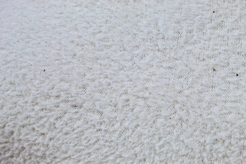 Soft and comfortable white fleece fabric texture © Hendri