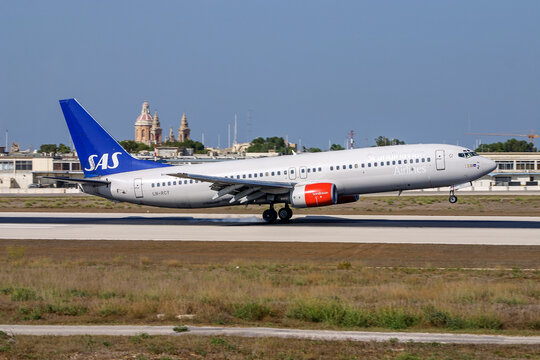 Luqa, Malta - August 20,  2005: Scandinavian Airlines - SAS Boeing 737-883 (Reg.: LN-RCY) landing runway 14.