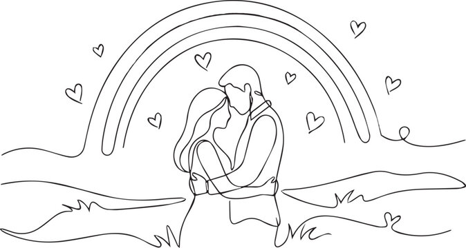 Couple embracing under a rainbow