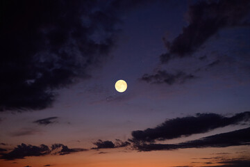 Fototapeta premium Full Moon on a twilight background.