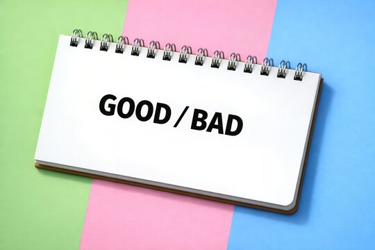 GOOD／BADの文字が書かれたノートが良し悪しを比較して判断する場面を象徴するイメージ