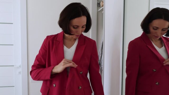 Female Trying On Stylish Blazer with Mirror Reflection, Getting Dressed, Morning Routine and Personal Style Fashion Concept