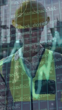 Vertical video: Builder fixing vest while sensor starting graph code grid on vest for analytics
