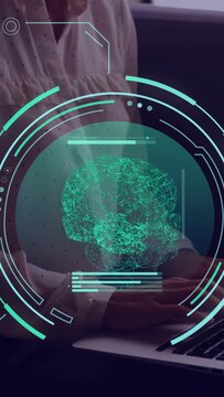 Vertical video: Woman placing hands on laptop, typing while technology HUD overlaying brain data