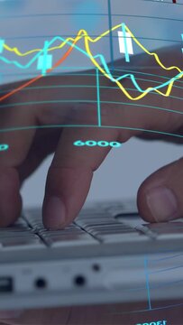 Vertical video: Fingertips hovering, hands pressing keys while chart peaks rising, showing trading