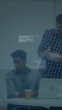 Vertical video: Dev typing at laptop, lead leaning in pointing, driving code review overlay