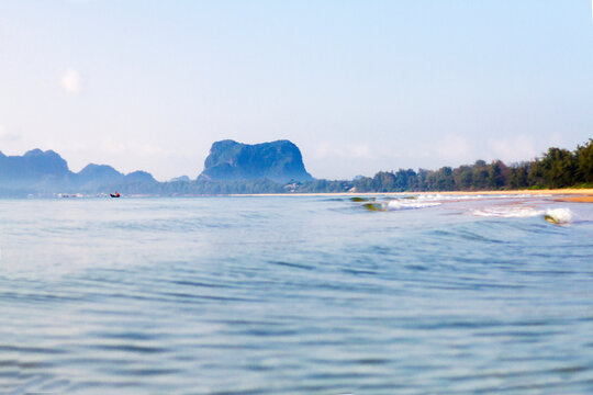 Beach and mountain on sea