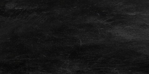 Fototapeta premium Dark textured background with scratched black surface for design and layout