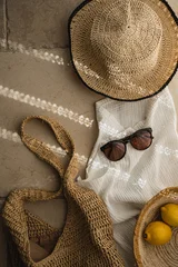 Sunny Travel Aesthetic Featuring Beach Bag Sunglasses And Hat On Stone Floor © Floral Deco