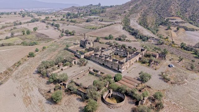 Drone flying away from abandoned ex hacienda caxcantla in puebla mexico