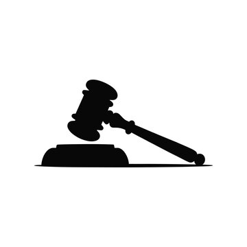 Silhouette of a judge's gavel on a sounding block with authority