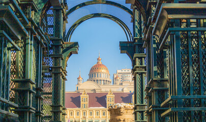 Russian-style architecture, framed by a steel structure, stands out in the heart of Harbin, China. © Thananchanok