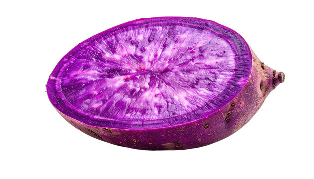 A vibrant purple sweet potato is sliced in half against a black background.