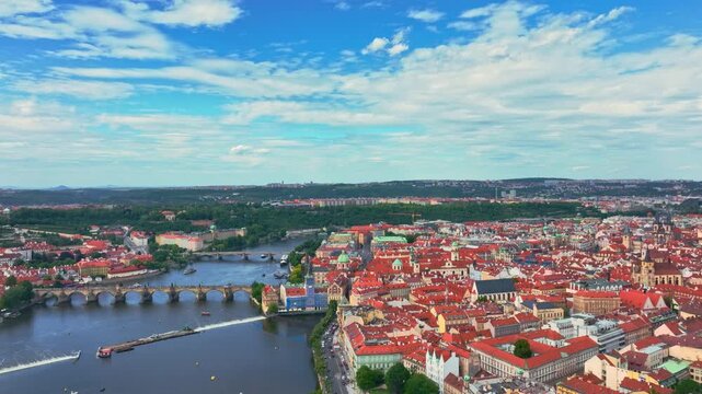 Prague historic bridges above Vltava river. Prague aerial view with Charles Bridge. Prague Charles Bridge districts. Prague cityscape with old architecture.